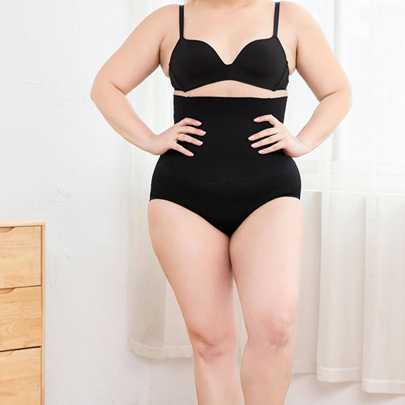 High-rise shaping brief in black, shown on a model